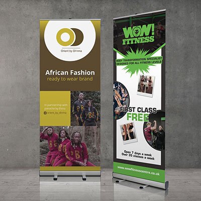 SW19-PUB Setting up roller banner display at exhibition stand London.